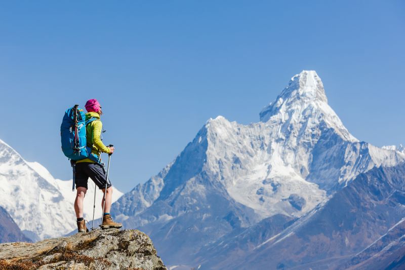 Everest Base Camp trek with snow-capped peaks and prayer flags